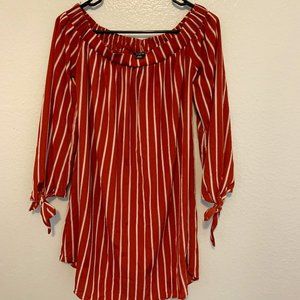 Rust and cream stripped off the shoulder mini-dress